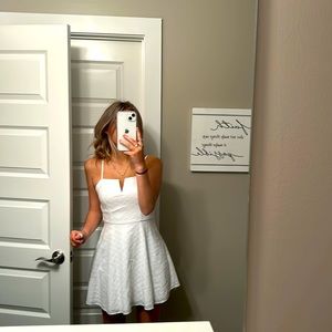 a really cute white dress, super flattering, love the fit
